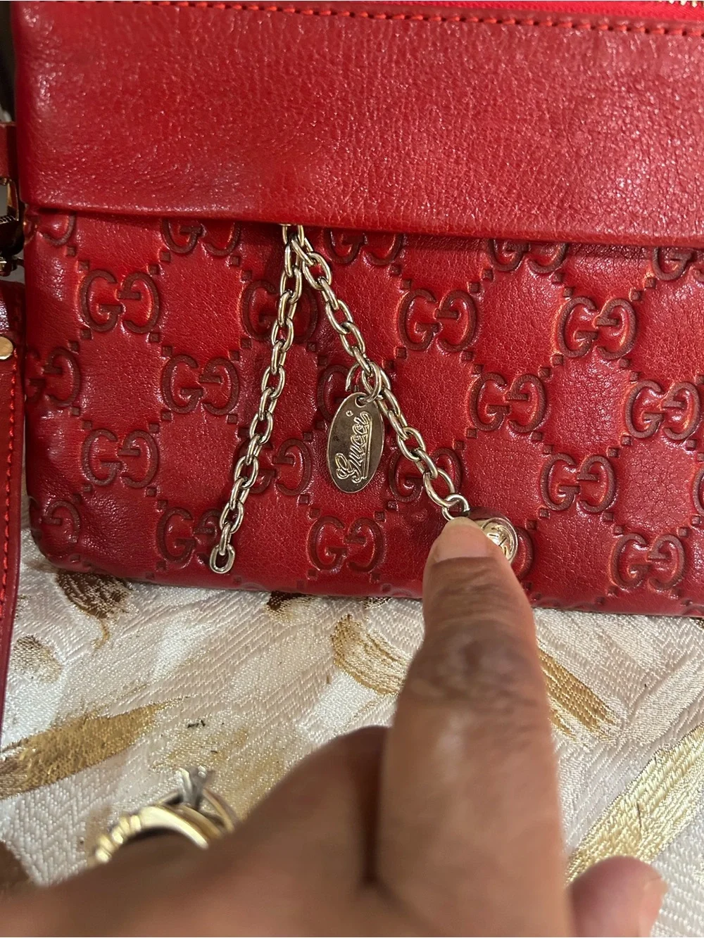 Vintage GG Red Embossed GG Leather Wristlet with Silver Chain Charm